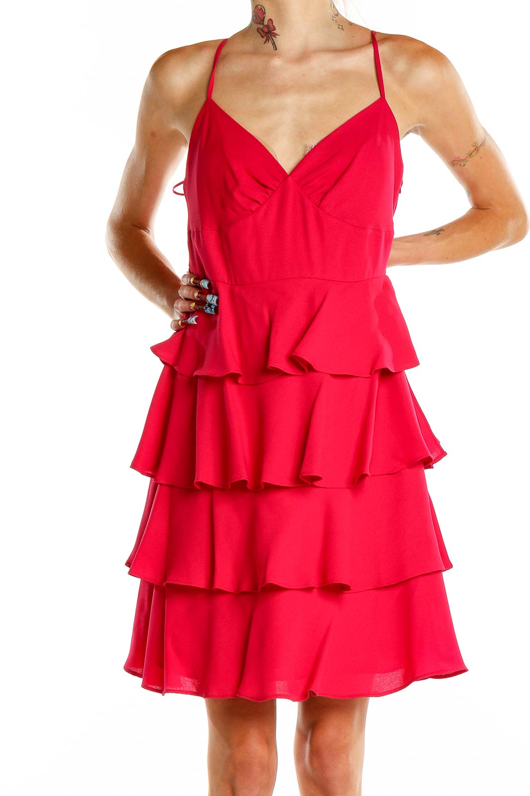 Front view of Patricia Field red tiered ruffle cocktail dress with V-neck and spaghetti straps