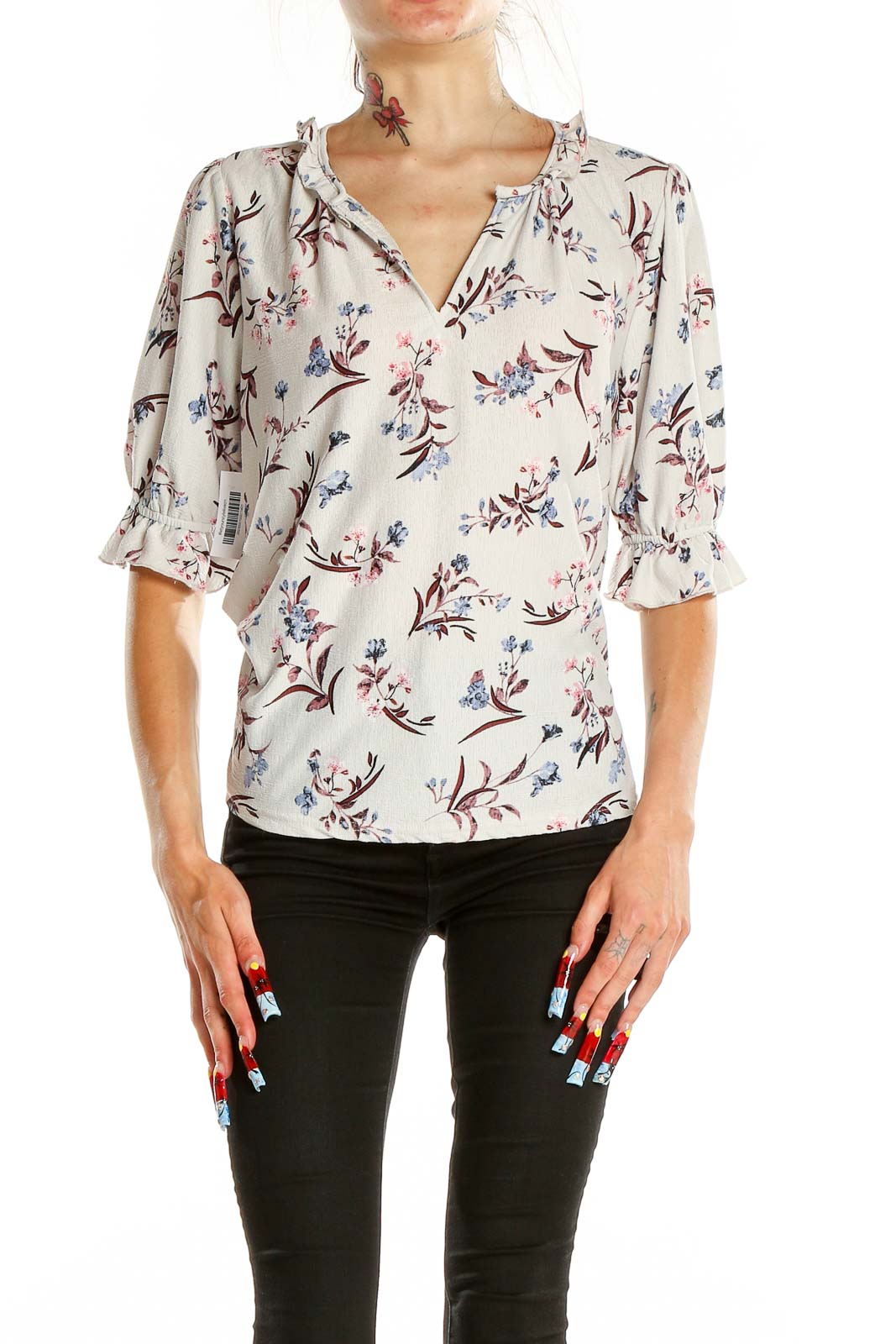 Front view of Melloday white floral print blouse with ruffle sleeves