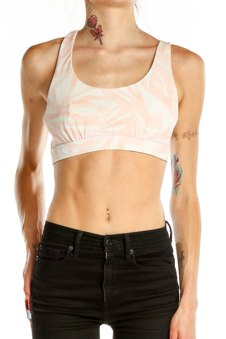 Front view of peach tie-dye Athleta athletic crop top