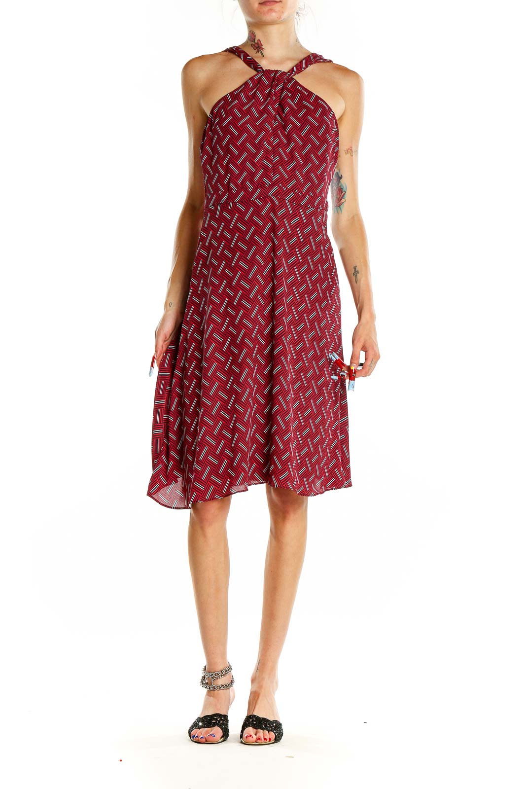 Front view of red geometric print halter dress from Banana Republic