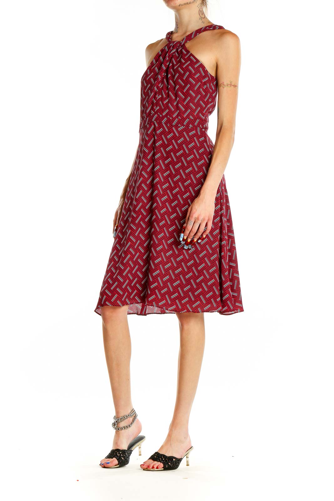 Front view of red geometric print halter dress from Banana Republic