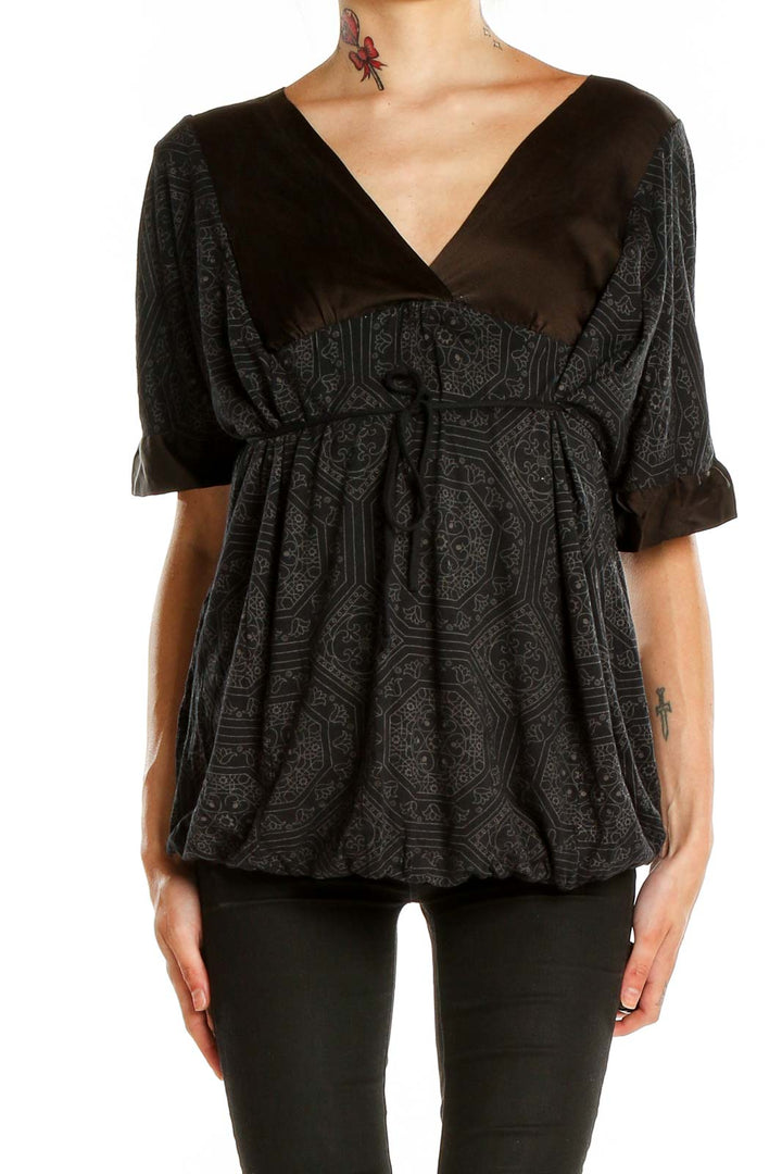 Front view of Ella Moss black patterned empire waist V-neck top