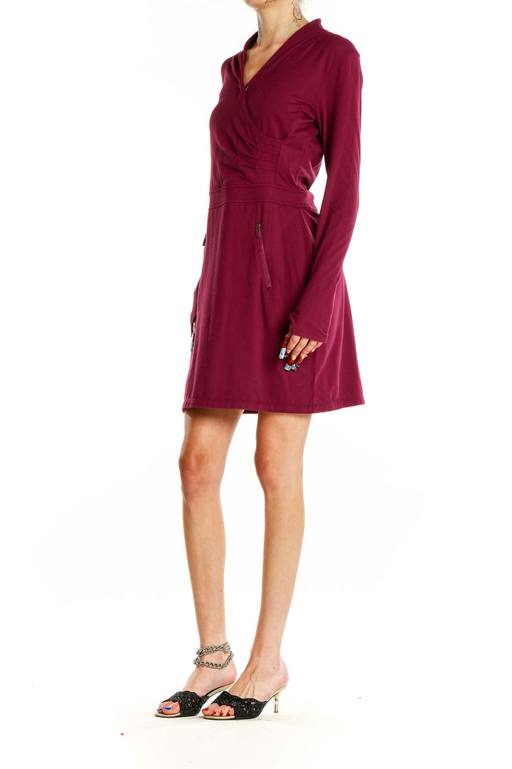 Front view of burgundy Athleta wrap-style athletic dress