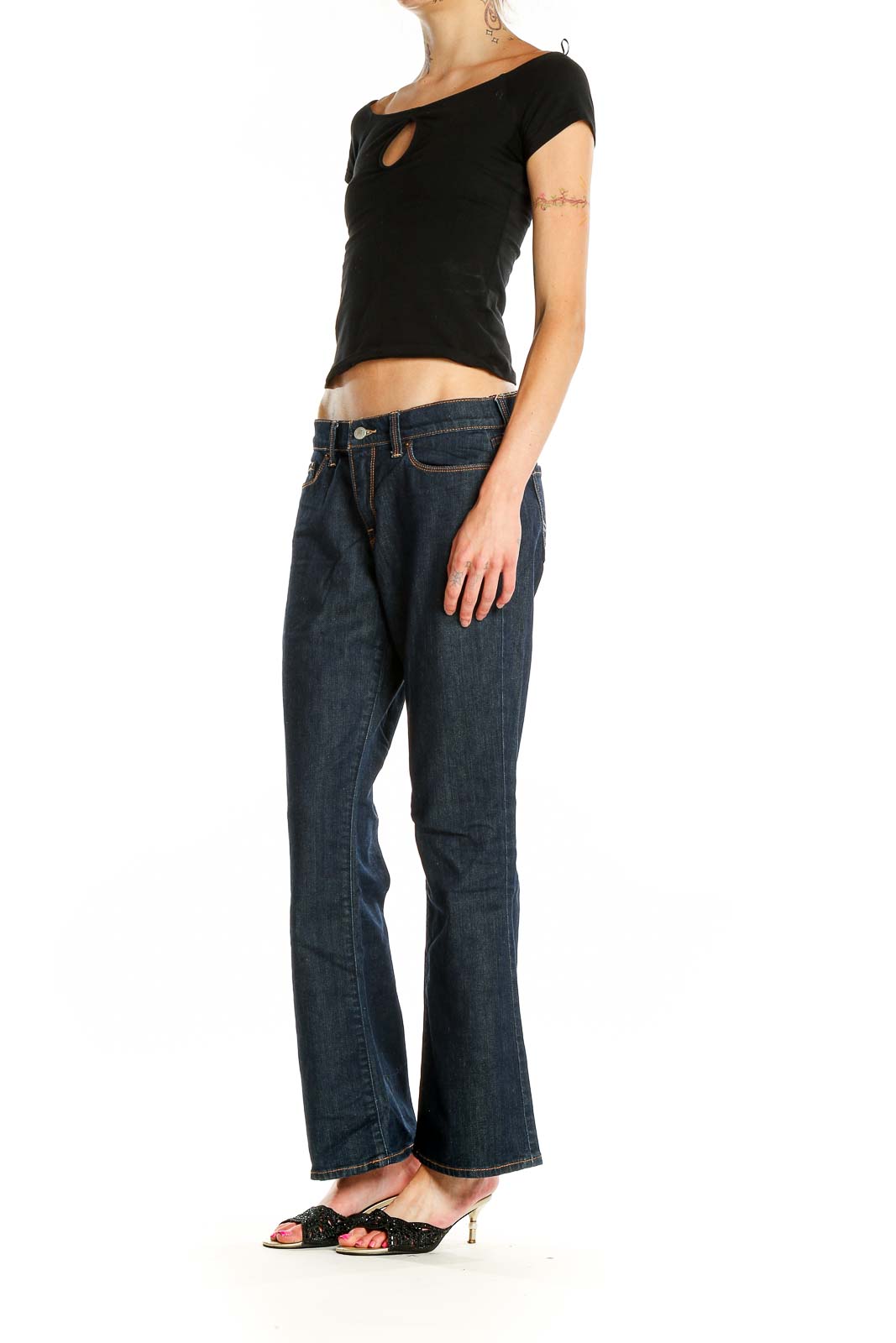 Front view of Lucky Brand dark blue bootcut jeans on model