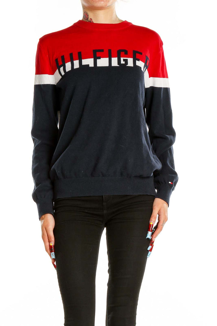 Front view of Tommy Hilfiger red and navy color-block knit sweater with large logo