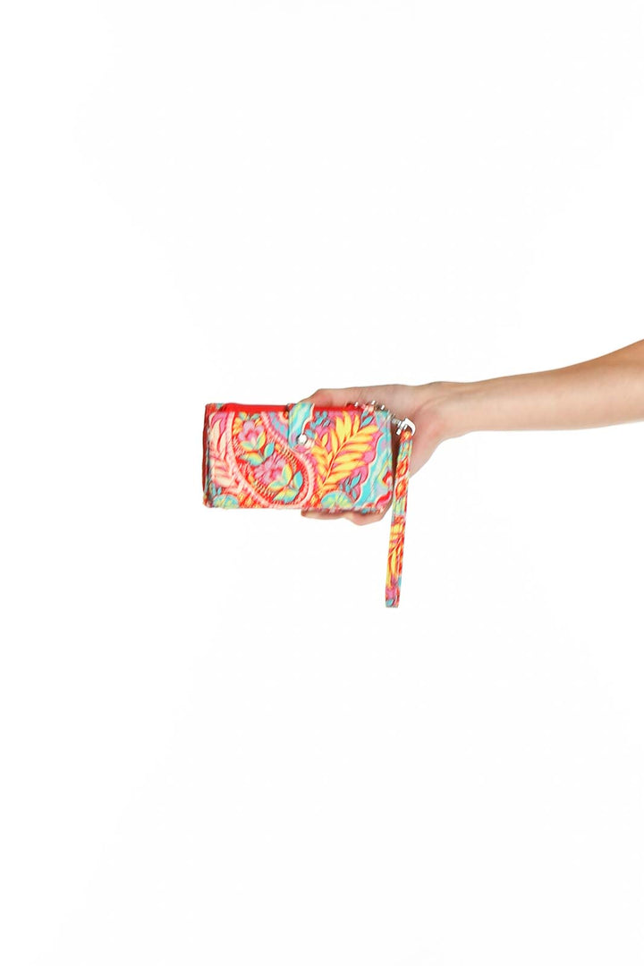 Front view of colorful floral print Vera Bradley clutch with wristlet strap