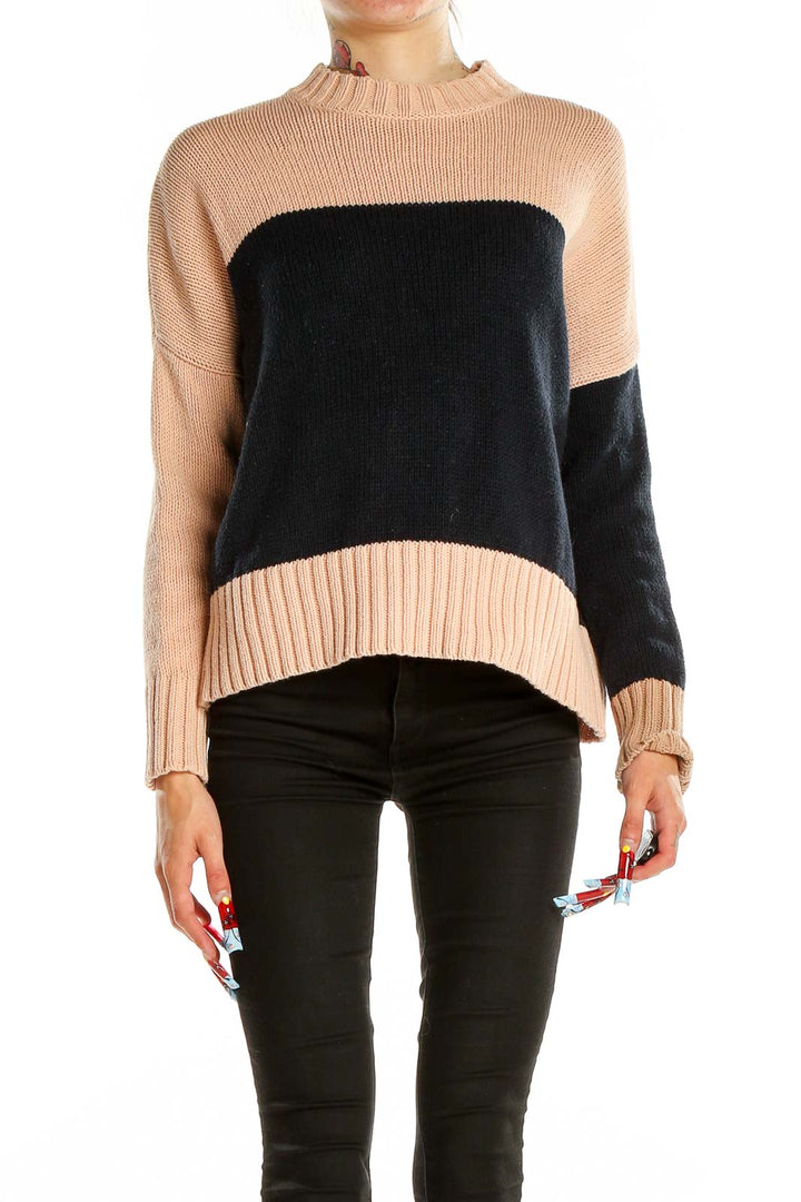 Front view of 360 SWEATER beige and black color block knit sweater with mock neck