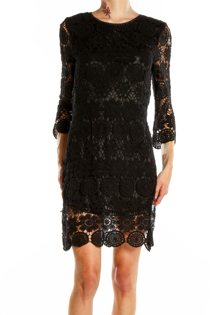 Front view of black lace crochet cocktail dress by Beulah