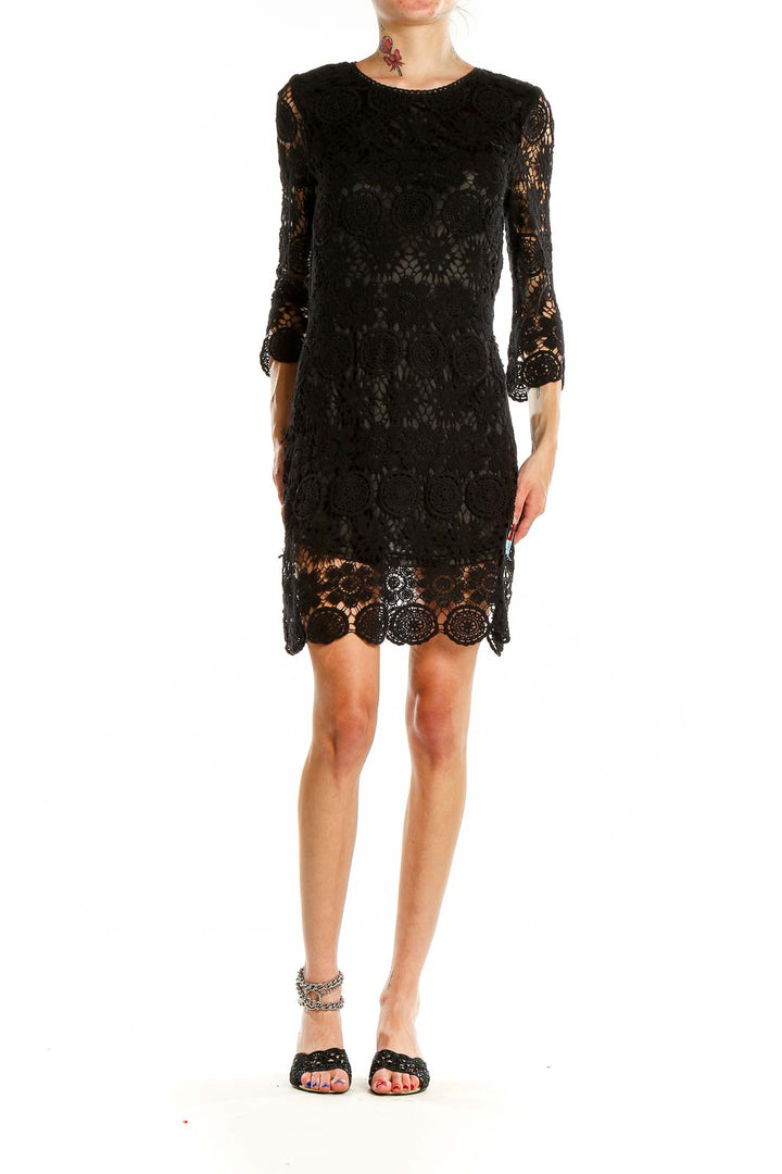 Front view of black lace crochet cocktail dress by Beulah