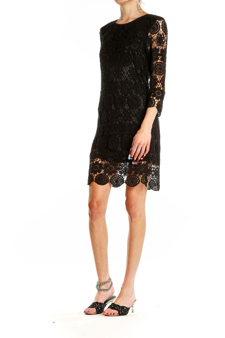 Front view of black lace crochet cocktail dress by Beulah