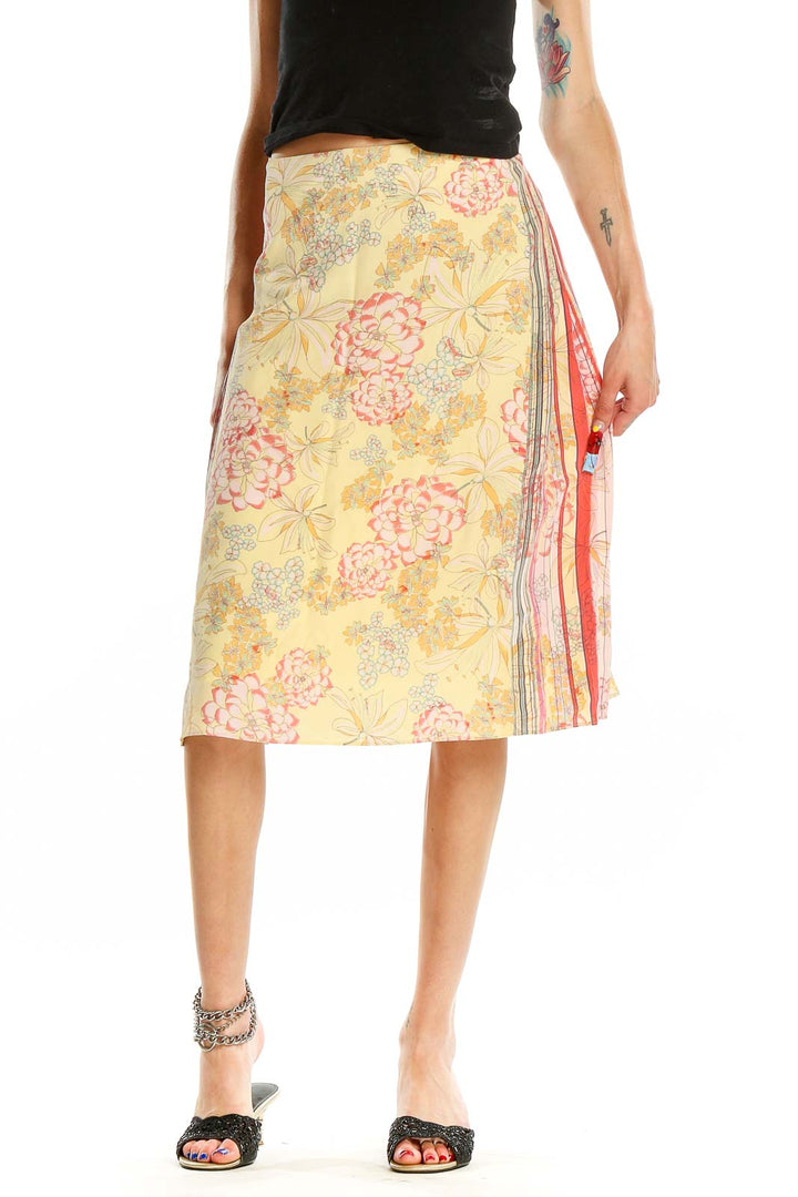 Front view of St. John Sport yellow floral print midi skirt with striped side panel