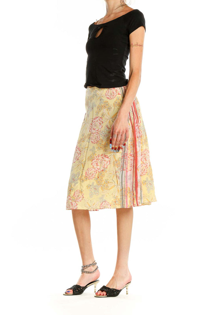 Front view of St. John Sport yellow floral print midi skirt with striped side panel