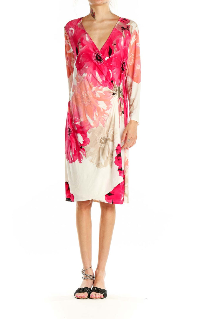 Front view of Calvin Klein pink floral wrap midi dress