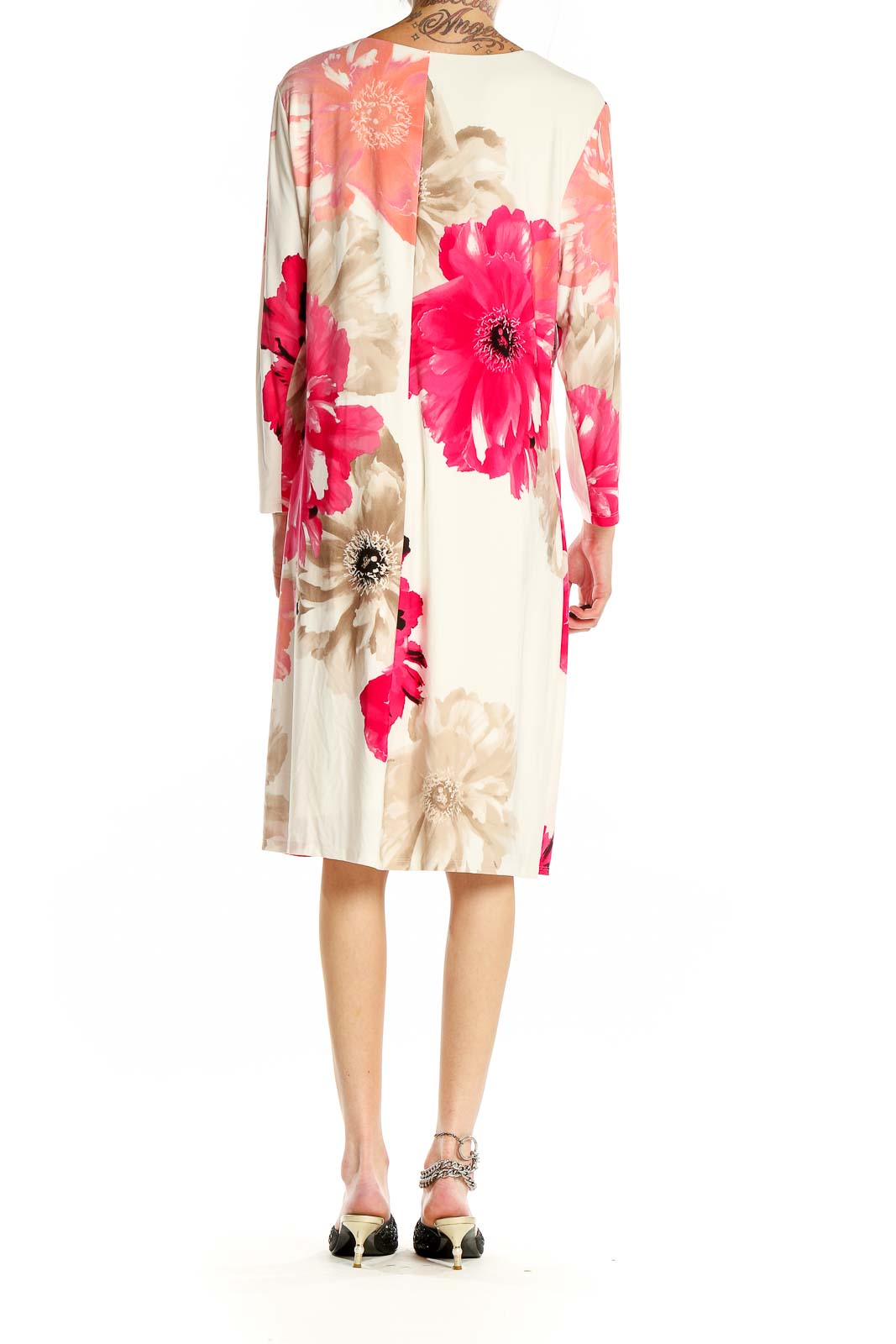 Side view of Calvin Klein pink floral wrap midi dress showing wrap detail