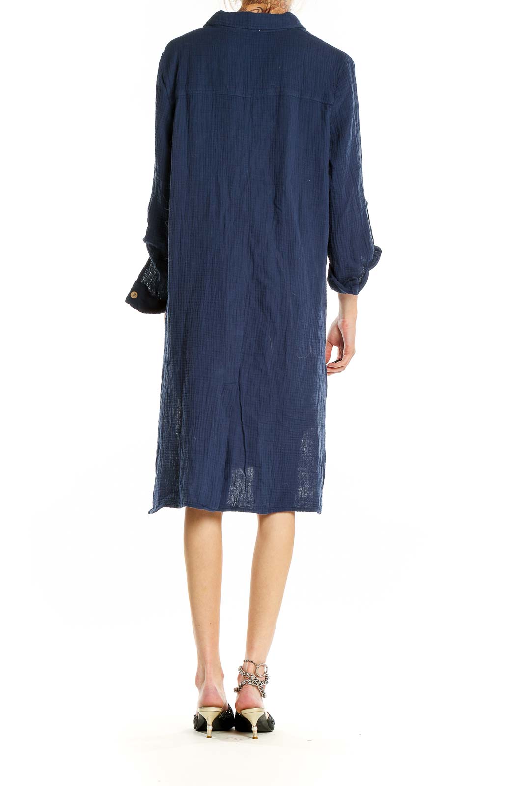 Side view of navy button-down shirt dress by 4our Dreamers showing high-low hemline