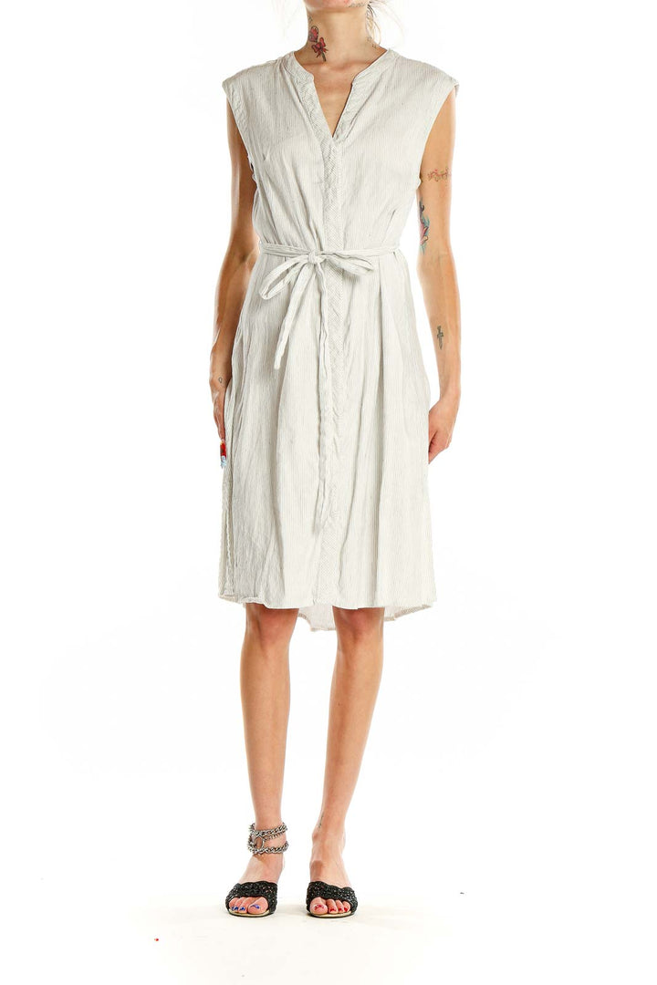 Front view of white sleeveless wrap midi dress by Tahari