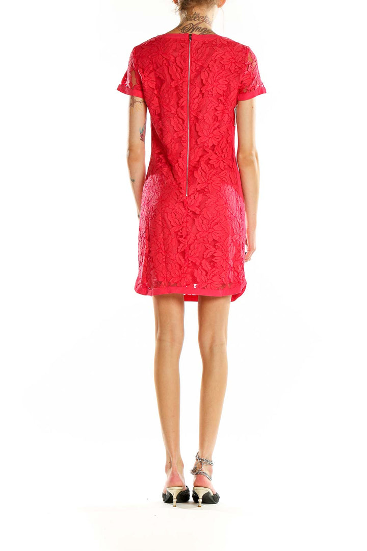 Back view of red floral lace short sleeve dress by Donna Morgan showing zipper closure