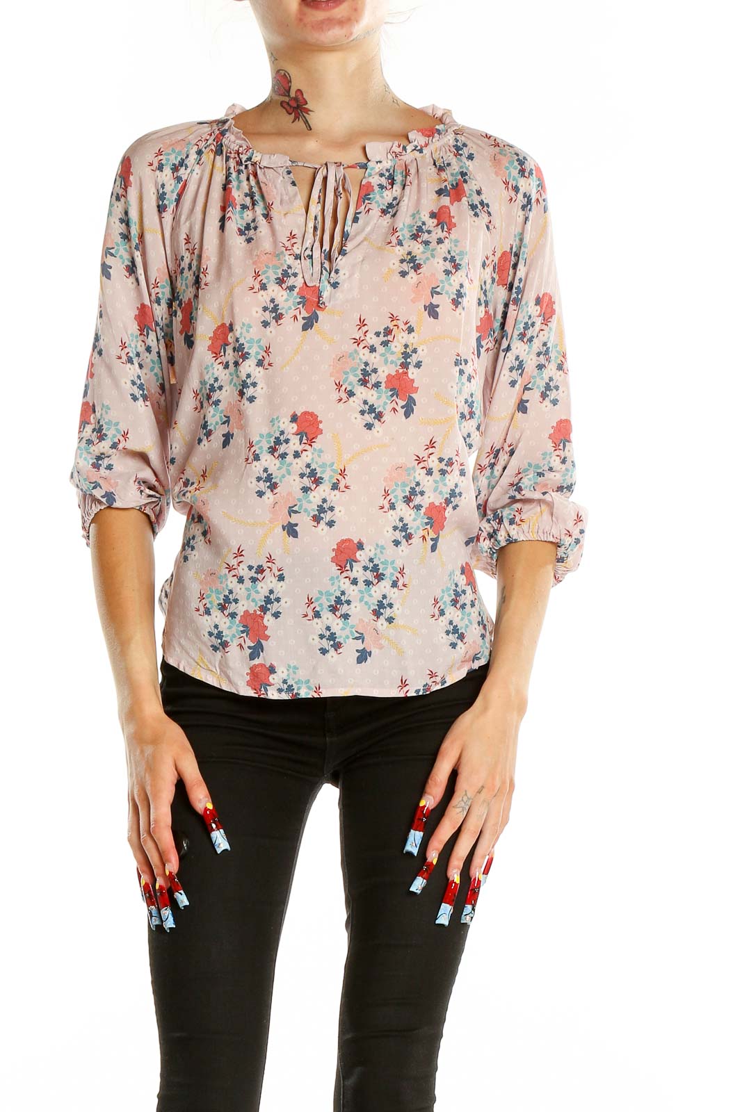 Front view of pink floral peasant blouse with gathered neckline