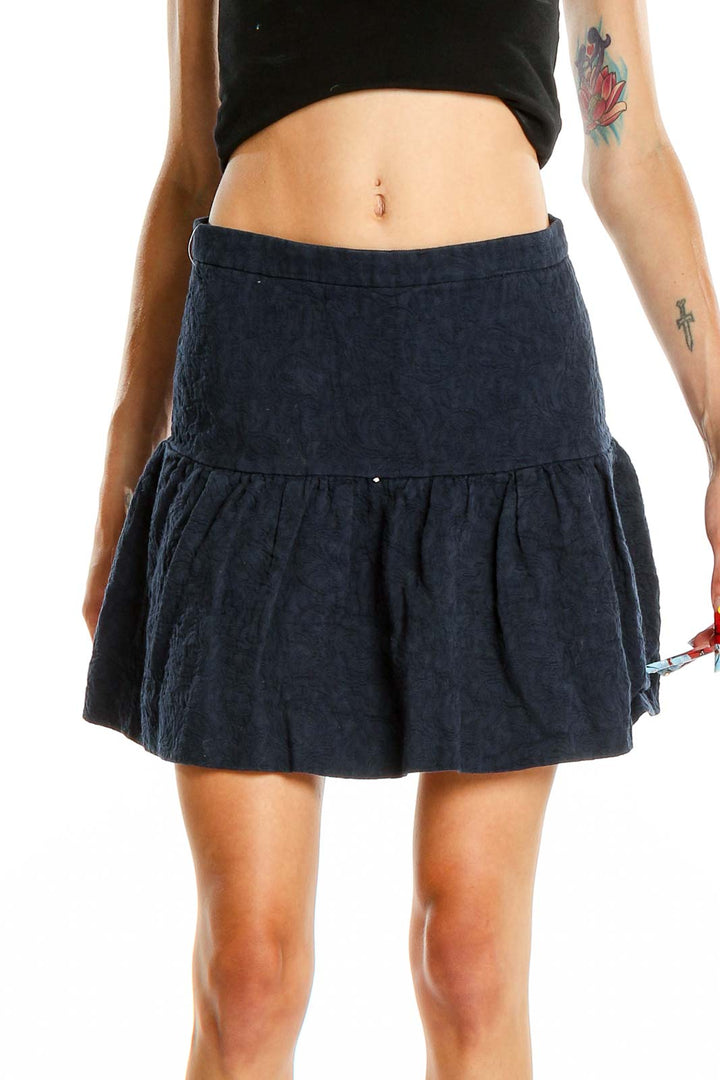 Front view of J.Crew navy flared mini skirt on model