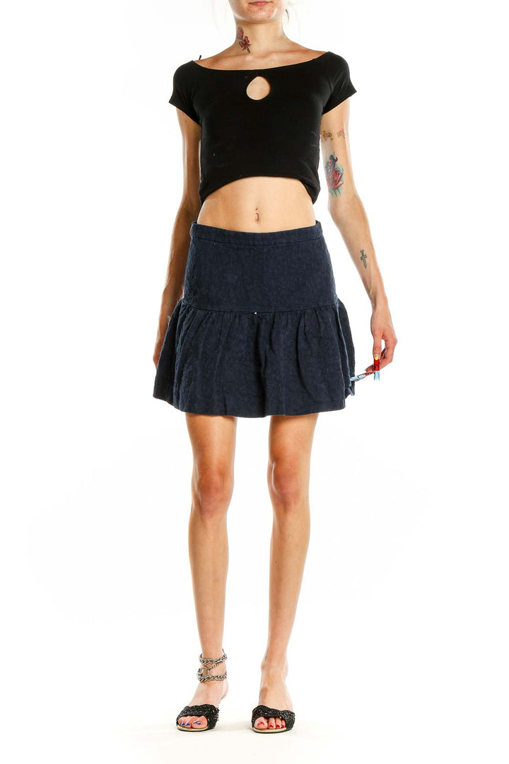 Front view of J.Crew navy flared mini skirt on model