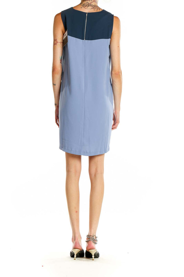 Back view of Cynthia Rowley blue color block sleeveless shift dress with zipper closure