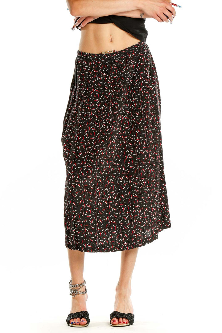 Front view of Leslie Fay black floral print midi skirt on model