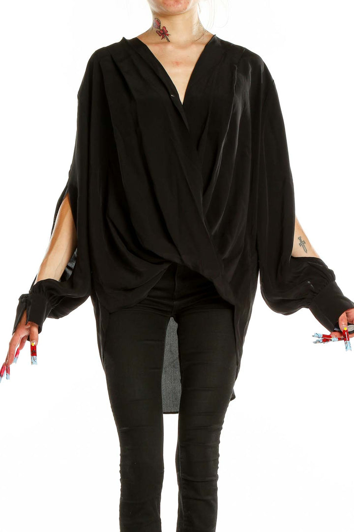 Front view of 7 For All Mankind black draped wrap blouse with V-neck and crossover design