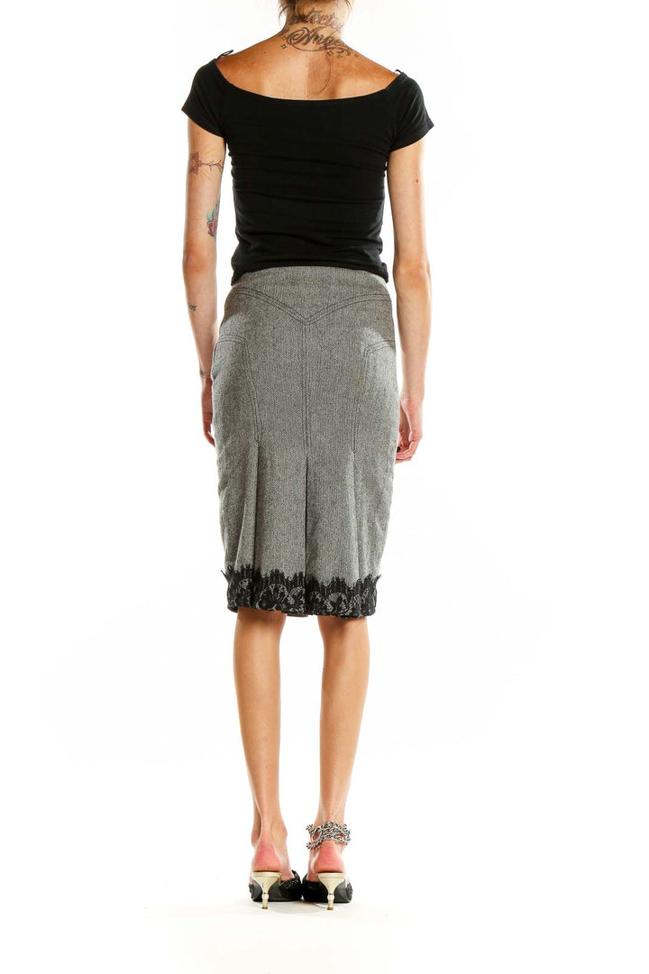 Back view of Karen Millen gray pencil skirt showing tailored fit and lace hem