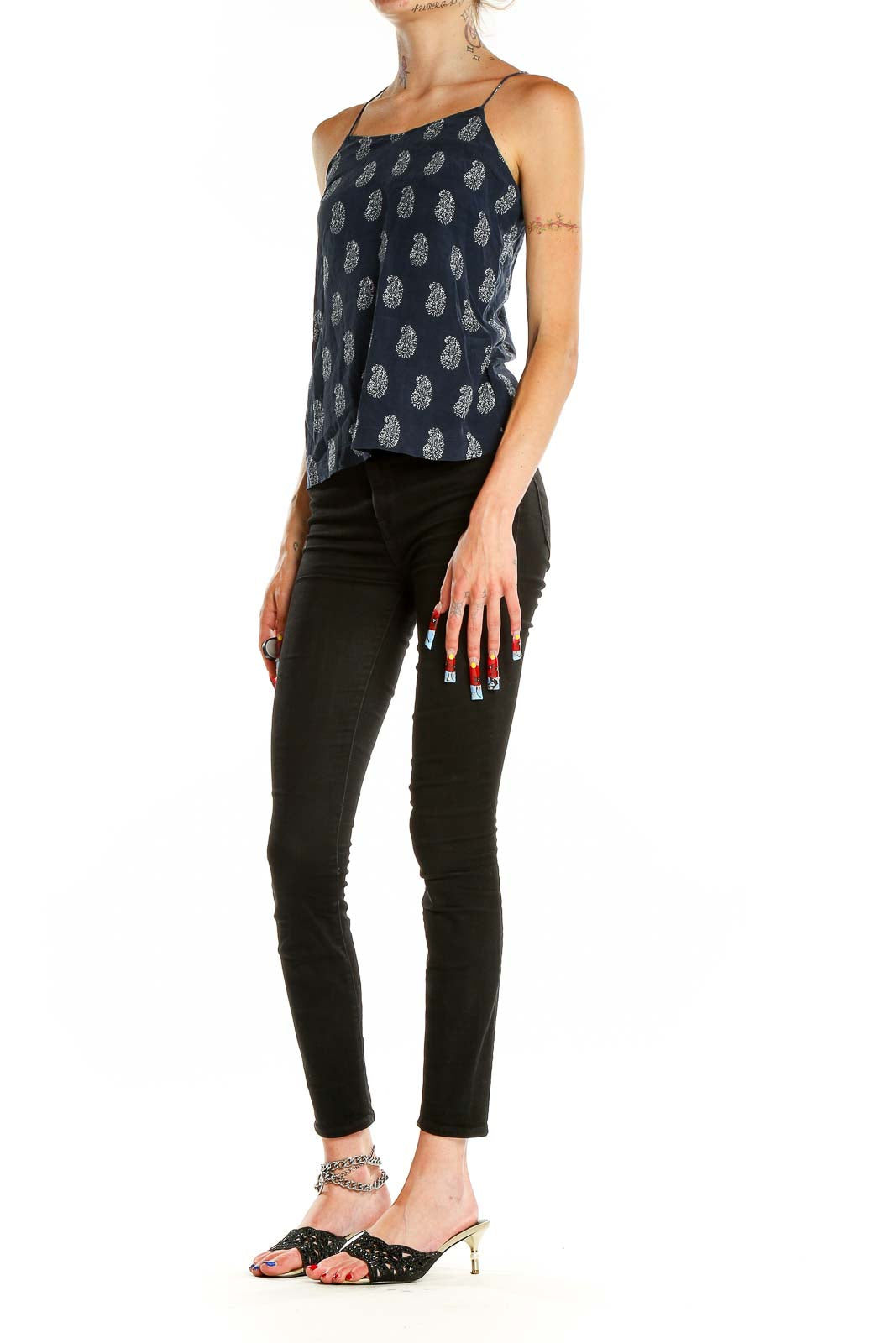 Front view of Madewell navy camisole top with white paisley print