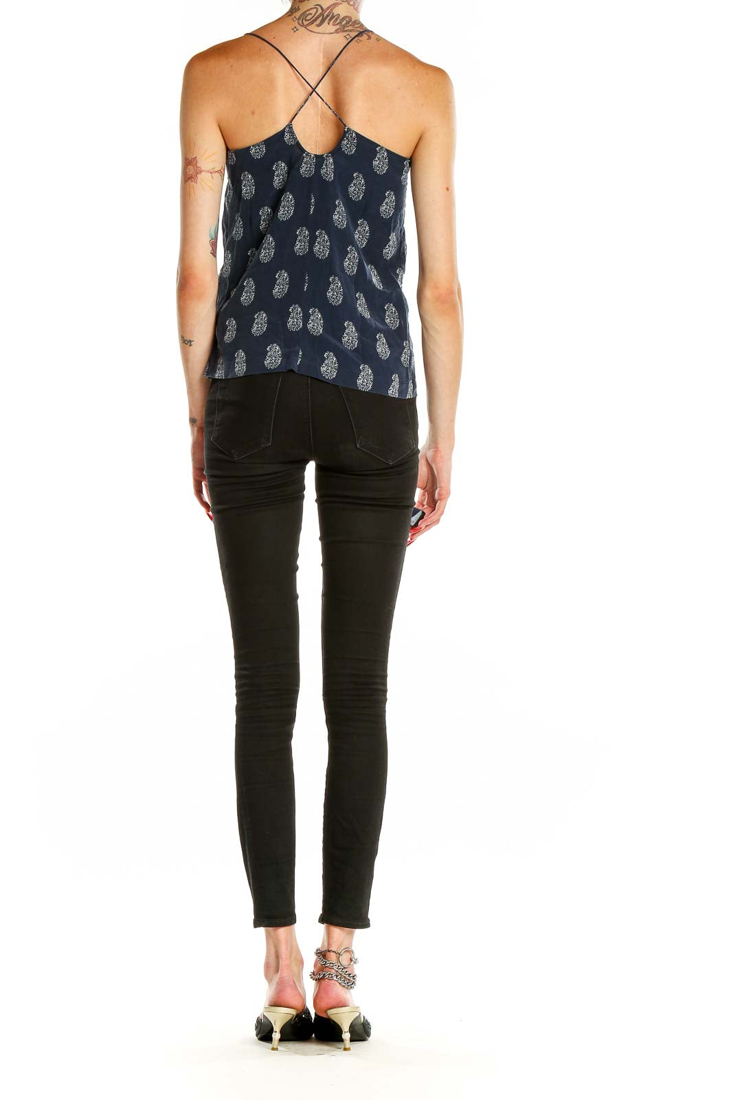 Back view of Madewell navy camisole top with white paisley print and cross-back straps