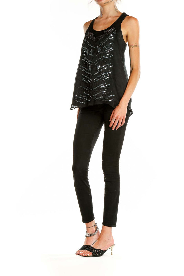 Front view of black sequined tank top with chevron pattern