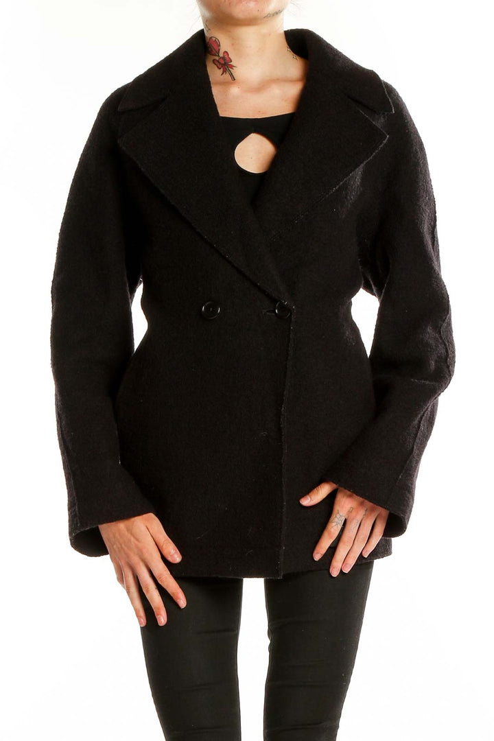 Front view of Banana Republic black double-breasted peacoat on model