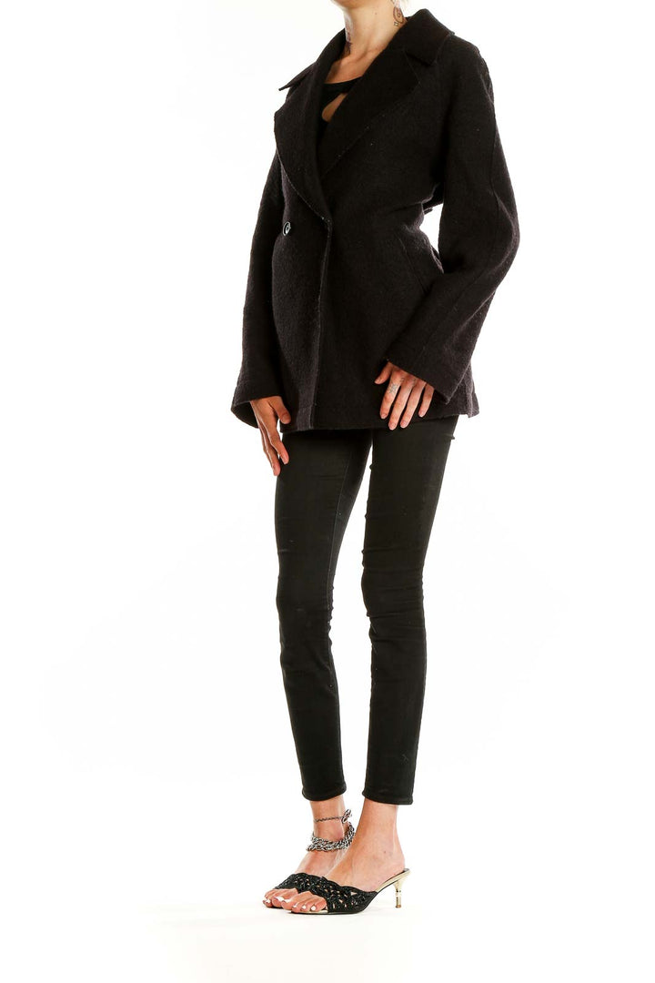 Front view of Banana Republic black double-breasted peacoat on model