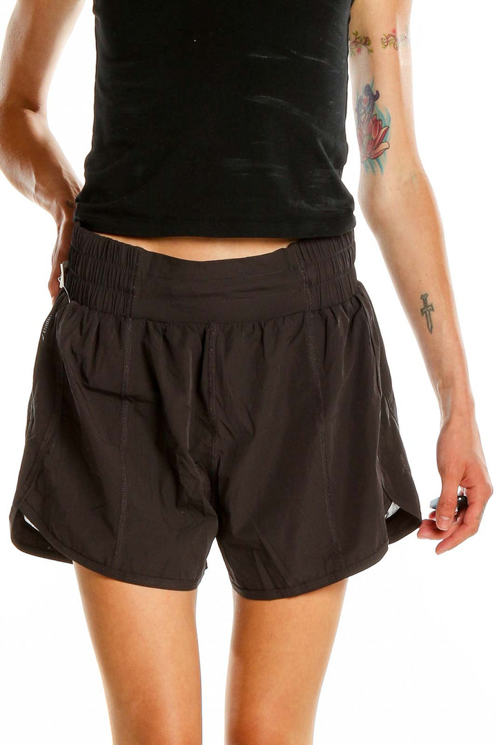 Front view of black Vitality athletic shorts with elastic waistband