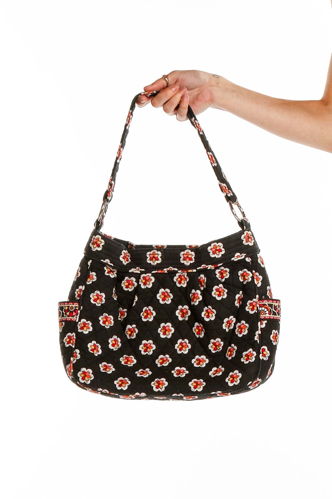 Front view of Vera Bradley black shoulder bag with red and white floral print