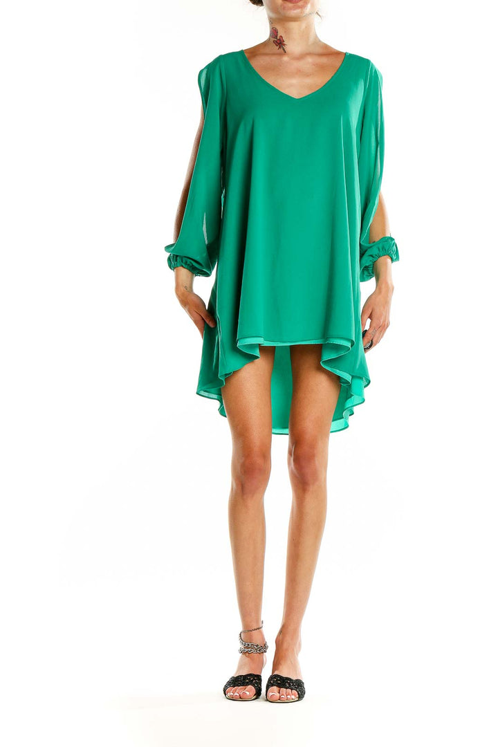 Front view of green Lovers and Friends mini dress with split sleeves