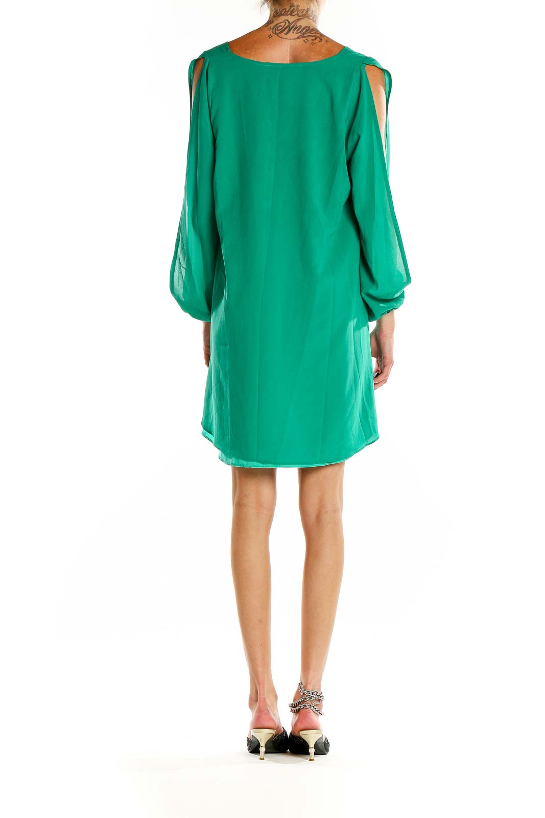 Back view of green Lovers and Friends mini dress showing high-low hemline