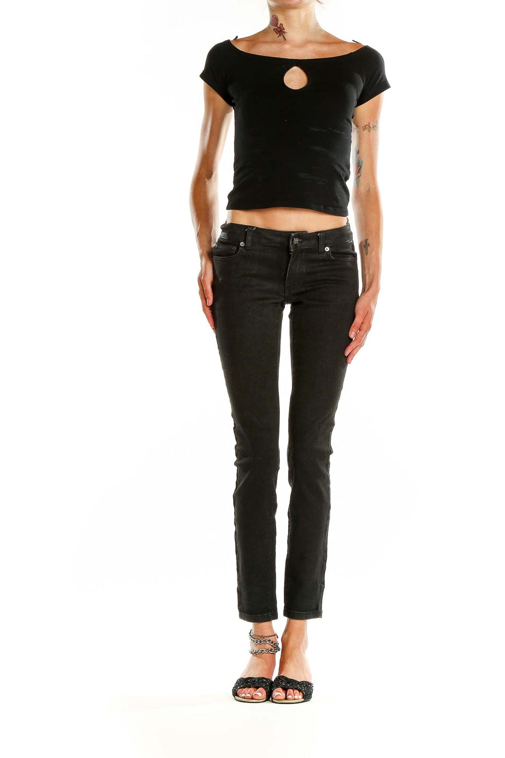 Front view of MICHAEL Michael Kors black slim-fit denim jeans on model