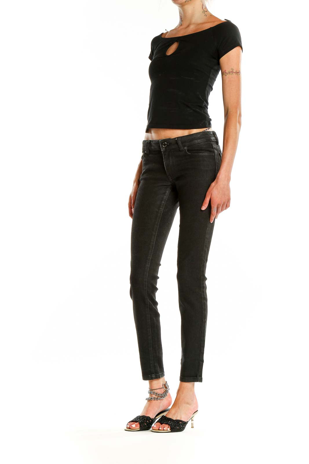 Front view of MICHAEL Michael Kors black slim-fit denim jeans on model