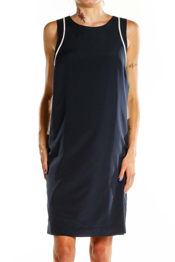 Front view of Banana Republic navy sleeveless shift dress with white piping