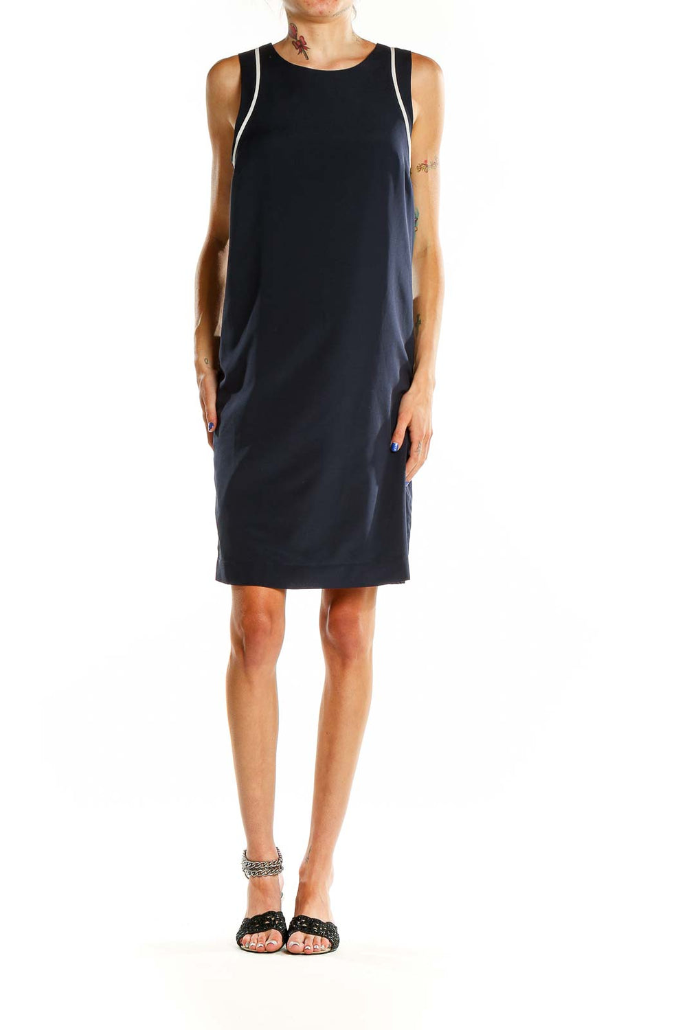 Front view of Banana Republic navy sleeveless shift dress with white piping