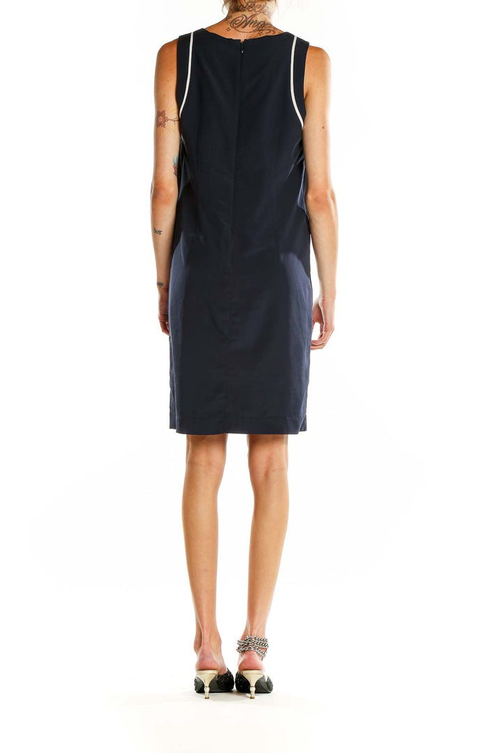 Back view of Banana Republic navy sleeveless shift dress showing clean lines and fit