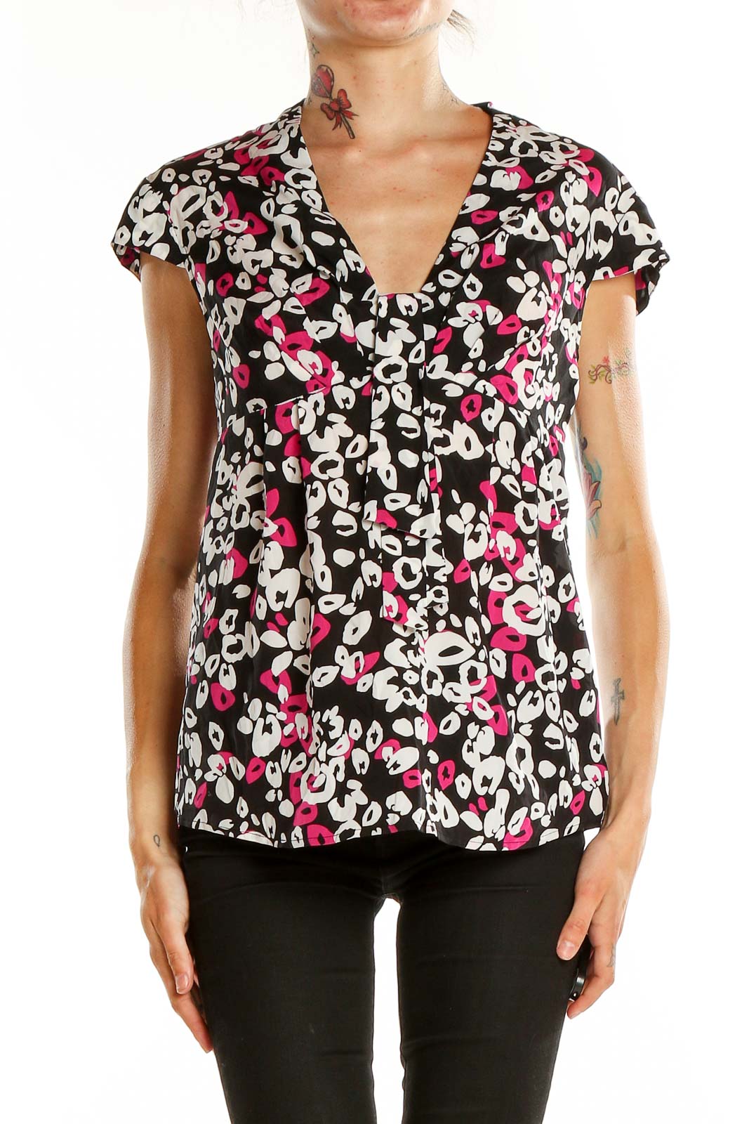 Front view of Trina Turk black floral print cap sleeve blouse