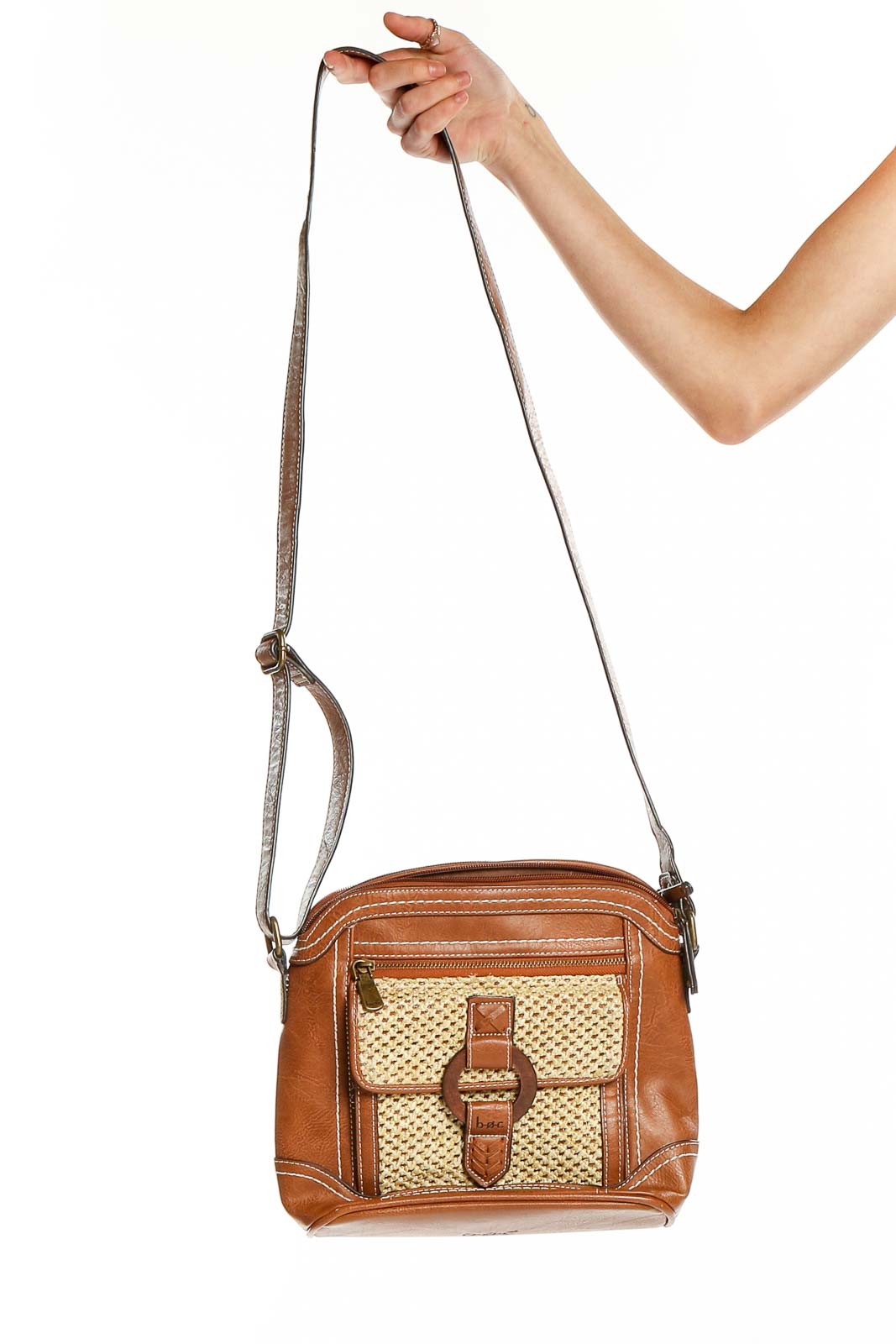 Front view of Born Concepts brown crossbody shoulder bag with woven pocket