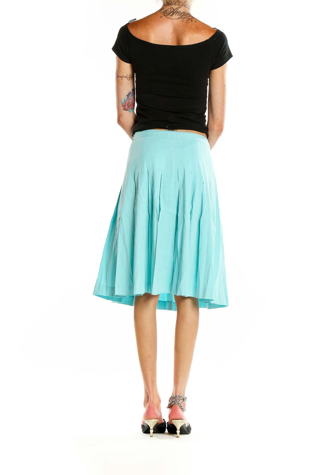 Back view of mint Theory pleated A-line midi skirt