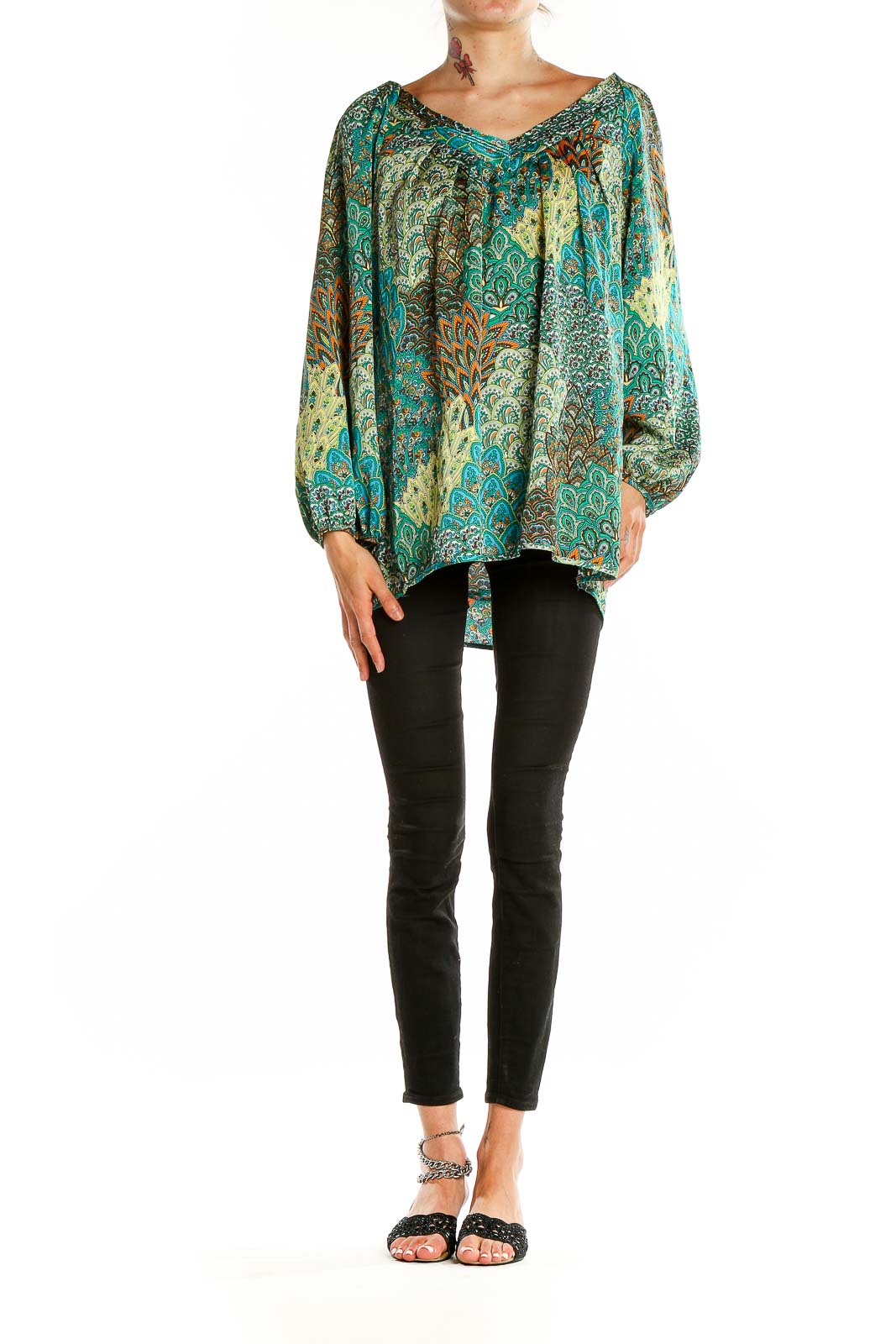 Front view of teal paisley print blouse with V-neckline and flowing sleeves