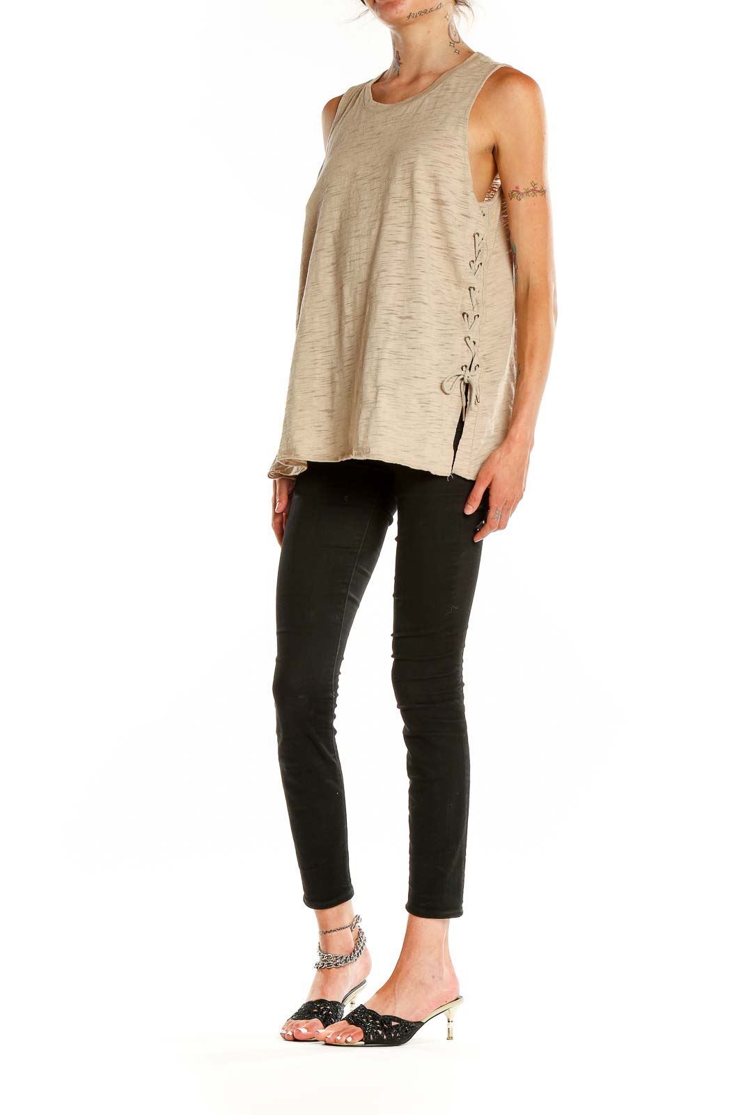 Front view of Umgee beige sleeveless tank top with lace-up sides