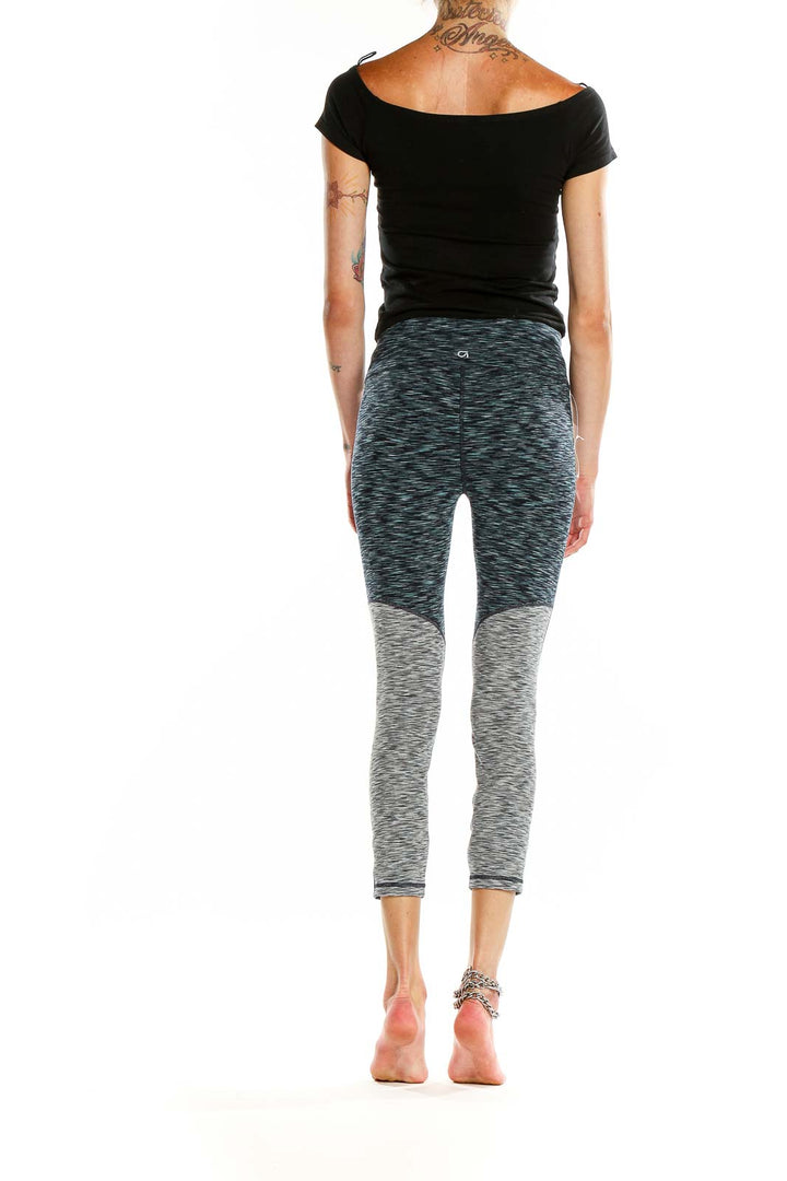 Back view of GapFit gray space-dyed cropped leggings on model