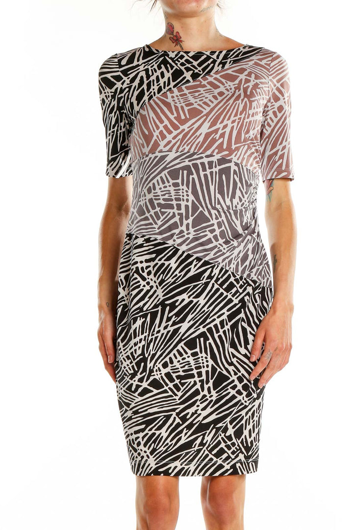 Front view of BCBG MaxAzria black and white abstract print bodycon dress