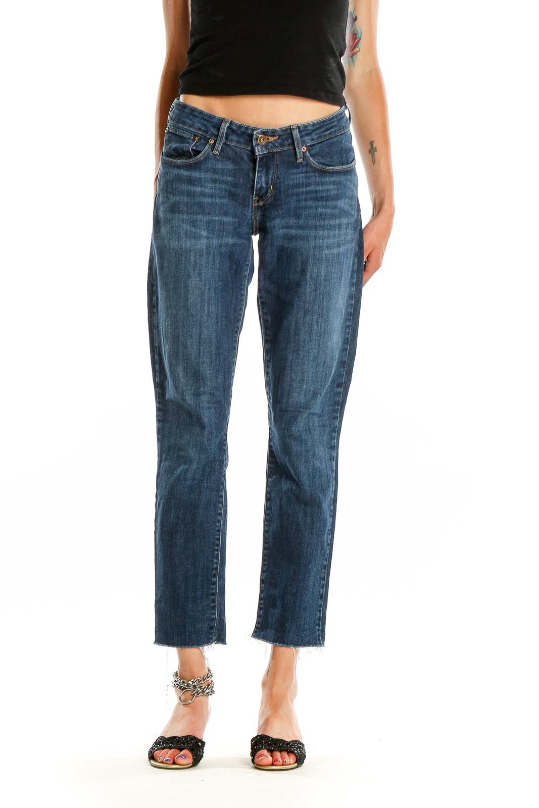 Front view of Levi's blue cropped straight-leg jeans on model